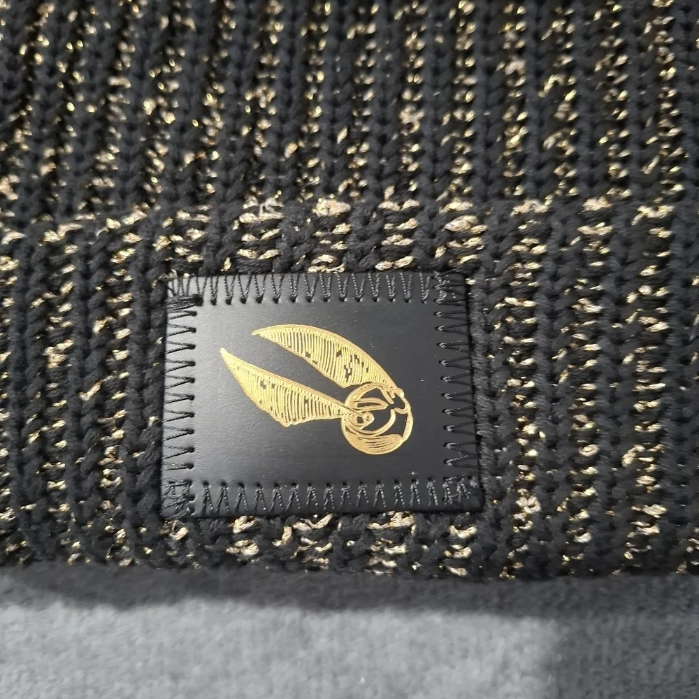 Love Your Melon Harry Potter Snitch Black Metallic Gold Pom Beanie